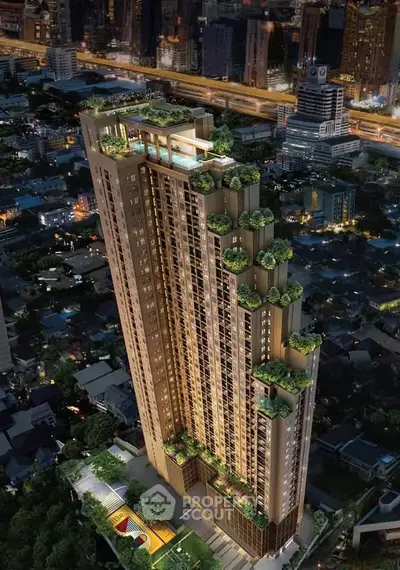 Stunning aerial view of a modern high-rise building with lush rooftop gardens in a vibrant cityscape.