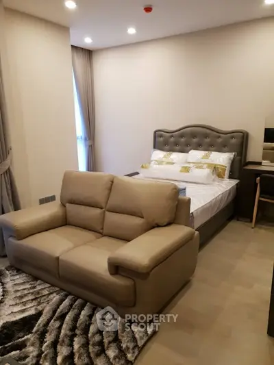 Modern bedroom with stylish furniture and cozy ambiance