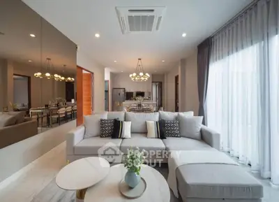 Luxurious modern living room with elegant decor and spacious layout