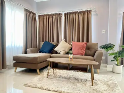 Stylish living room with cozy sectional sofa and elegant decor