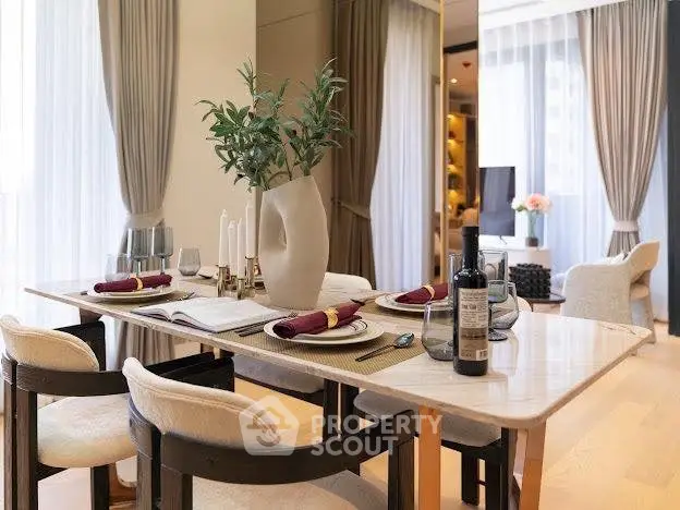 Elegant dining area with modern decor and natural light