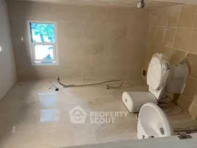 Spacious bathroom with modern fixtures and natural light