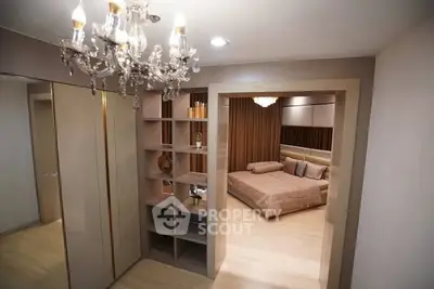 Luxurious bedroom with elegant chandelier and spacious design