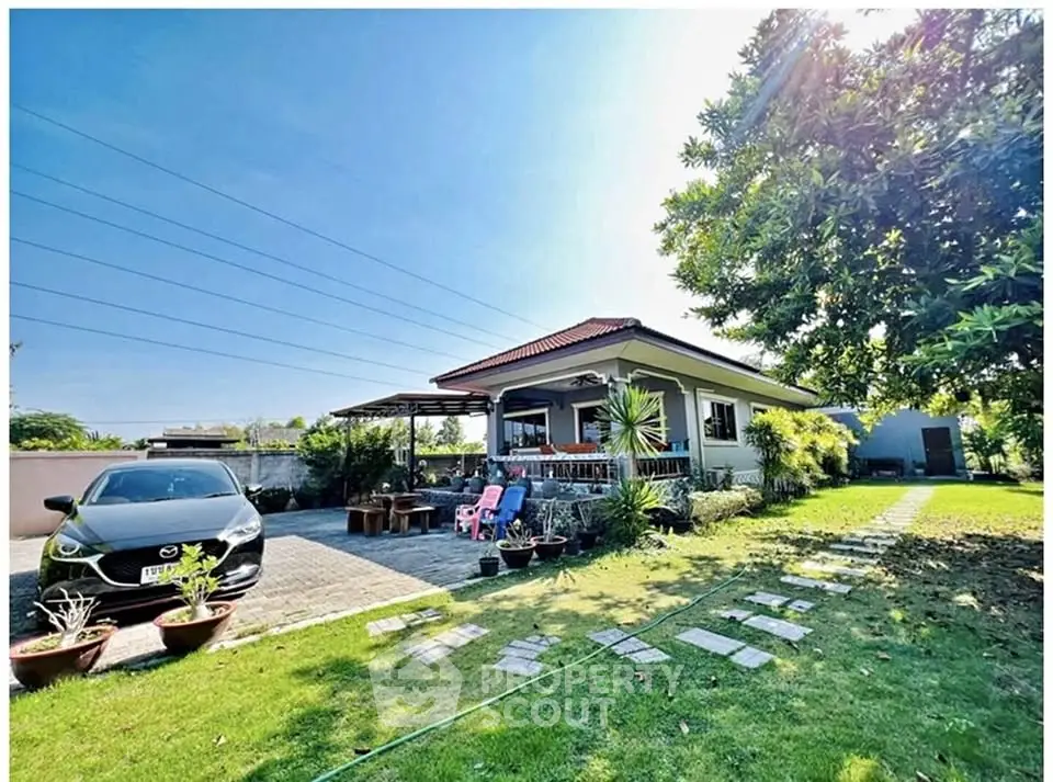 Charming single-story home with lush garden and spacious driveway