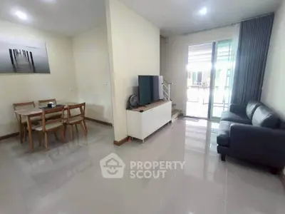 Modern living room with sleek furniture and natural light