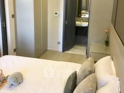 Cozy bedroom with modern decor and ensuite bathroom