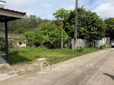 Charming suburban property with lush greenery and spacious outdoor area, perfect for gardening enthusiasts.