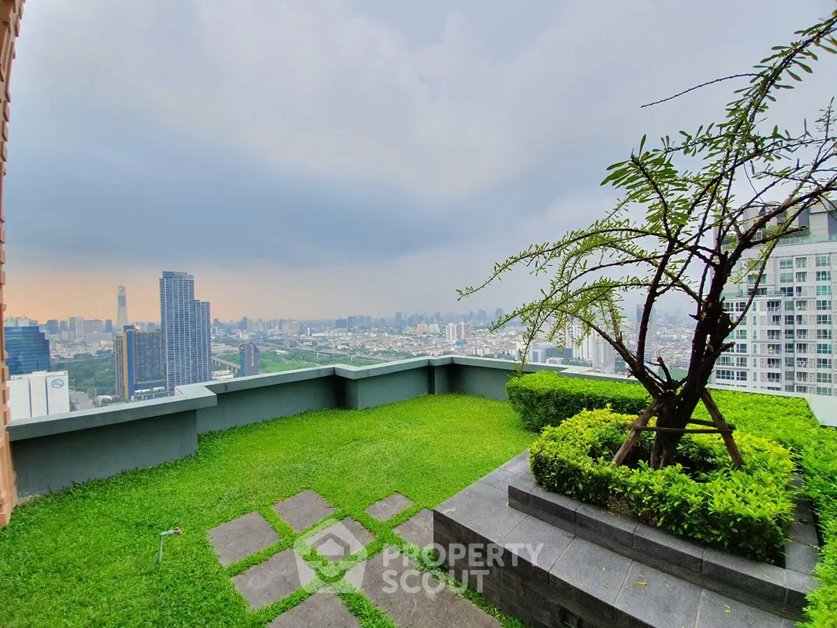 Stunning rooftop garden with panoramic city skyline view, perfect for relaxation and entertainment.