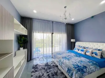 Spacious bedroom with elegant decor and large windows offering natural light and garden view.