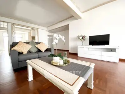 Spacious living room with elegant decor and modern furnishings, perfect for relaxation and entertainment.