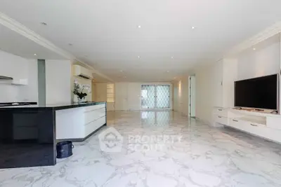Spacious modern living room with marble flooring and sleek design