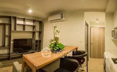 Modern living room with stylish furniture and air conditioning in a cozy apartment.