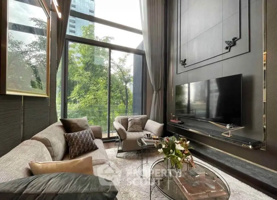 Luxurious modern living room with high ceilings and large windows offering a stunning view of greenery.