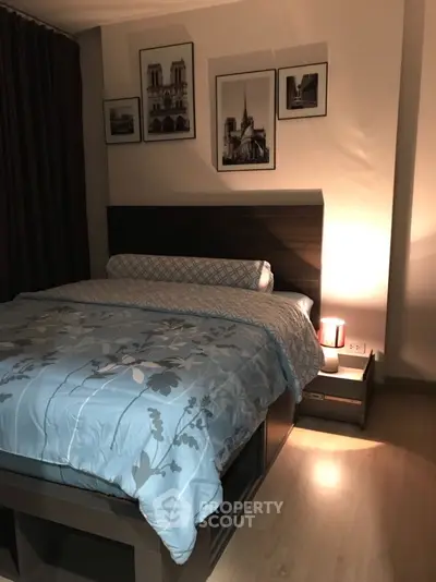 Cozy bedroom with modern decor and soft lighting