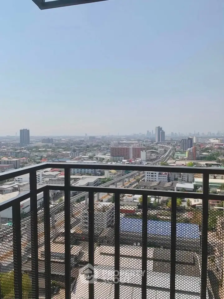 Stunning cityscape view from a high-rise balcony, perfect for urban living enthusiasts.