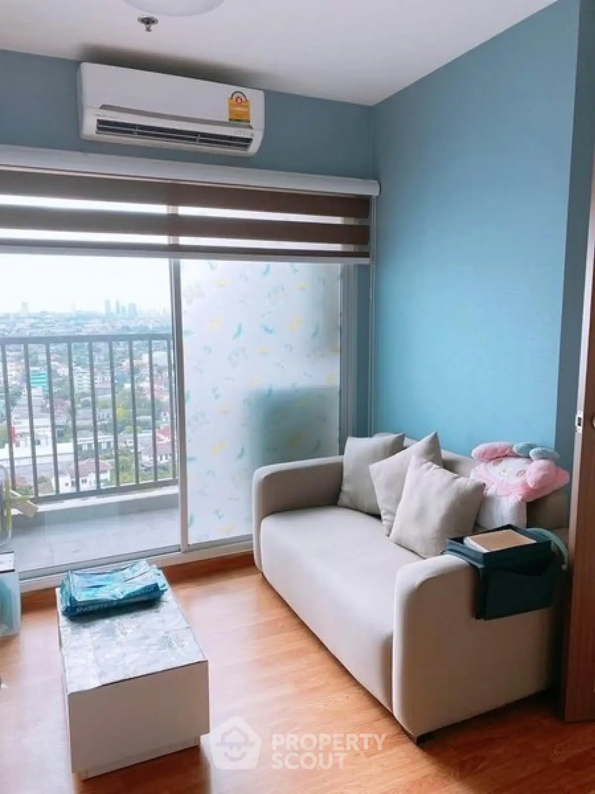 Cozy living room with city view and modern decor