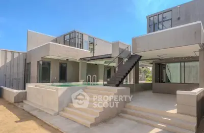 Modern architectural masterpiece with sleek design and private pool, perfect for luxury living.
