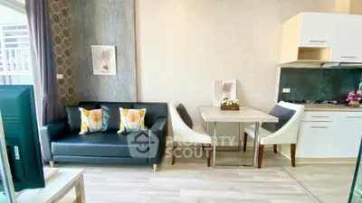 Modern living room with stylish decor and open kitchen layout