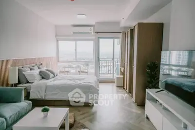 Modern bedroom with balcony and scenic view in a stylish apartment