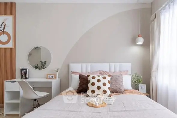 Stylish bedroom with modern decor and natural light