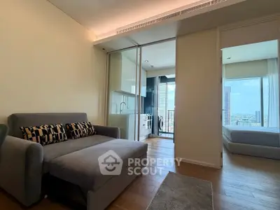 Modern apartment interior with cozy living room and city view balcony