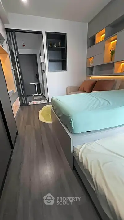 Modern bedroom with sleek design and built-in storage solutions