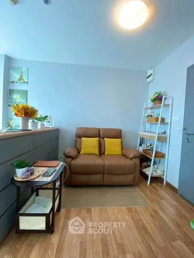 Cozy living room with leather sofa and modern decor