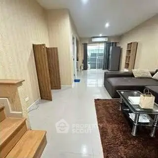 Spacious living room with modern furniture and stylish decor