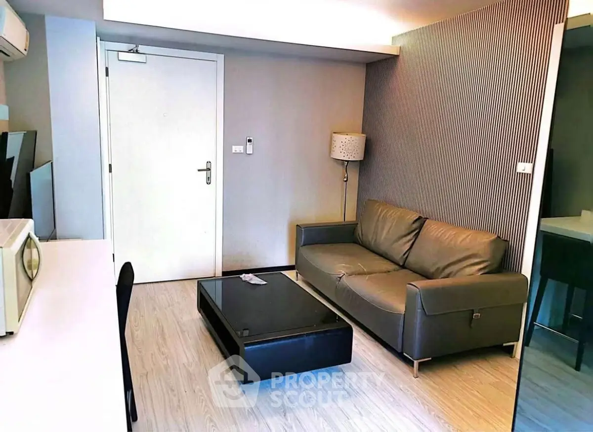 Modern living room with sleek furniture and stylish decor