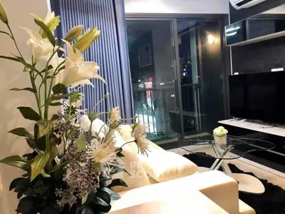 Stylish modern living room with city view and elegant decor