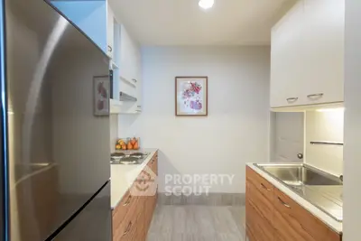 Modern kitchen with sleek cabinetry and stainless steel appliances