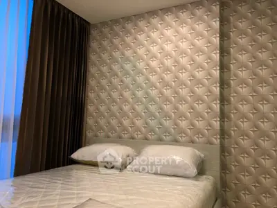 Modern bedroom with stylish 3D wall design and cozy bedding