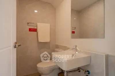 Modern bathroom with sleek fixtures and elegant tile design