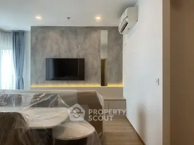 Modern living room with sleek TV setup and stylish decor