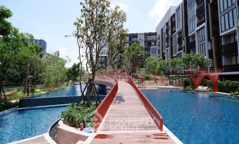 Luxurious residential complex with stunning pool and modern architecture