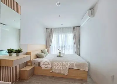 Modern minimalist bedroom with large window and stylish decor
