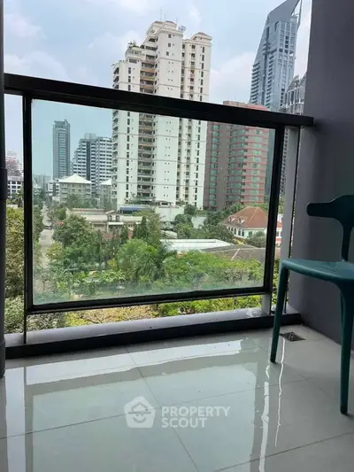 Modern balcony with city view, perfect for urban living enthusiasts seeking a serene outdoor space.