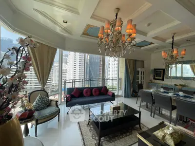 Luxurious living room with elegant chandeliers and stunning city view