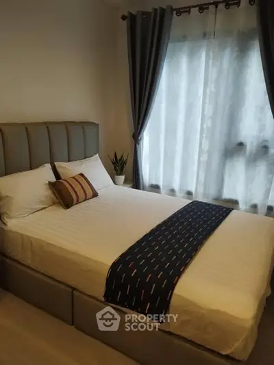 Cozy bedroom with elegant decor and natural light