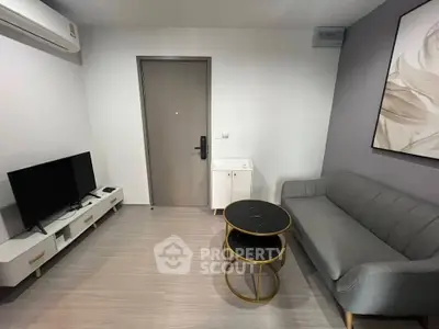 Modern living room with sleek furniture and minimalist decor