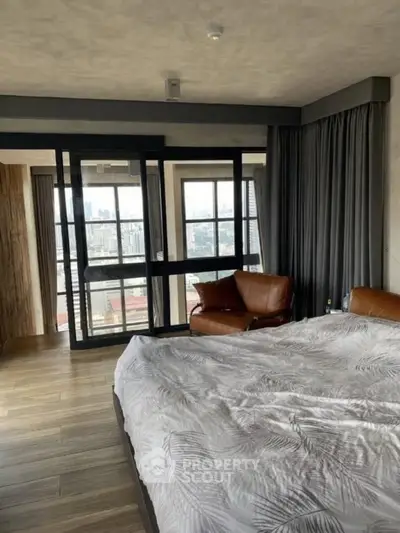 Luxurious bedroom with city view and modern decor