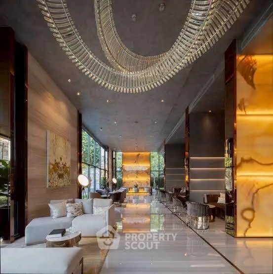 Luxurious modern living room with stunning chandelier and elegant decor