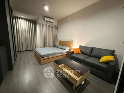 Modern bedroom with sleek furniture and cozy ambiance