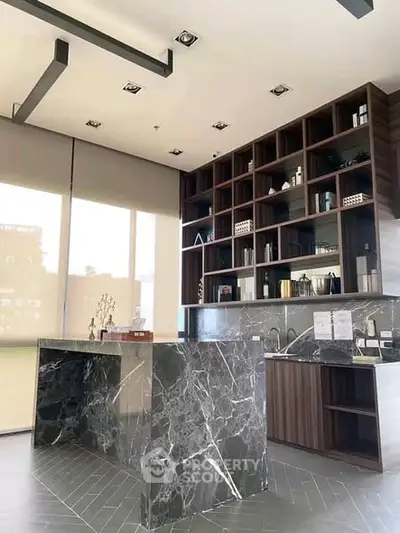 Luxurious modern kitchen with marble island and open shelving