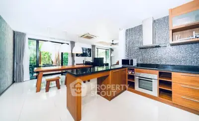 Spacious modern kitchen with open layout and sleek design
