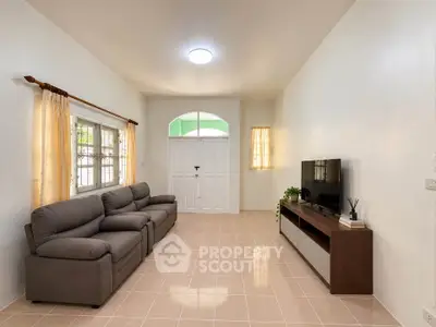Spacious living room with modern sofa and entertainment unit