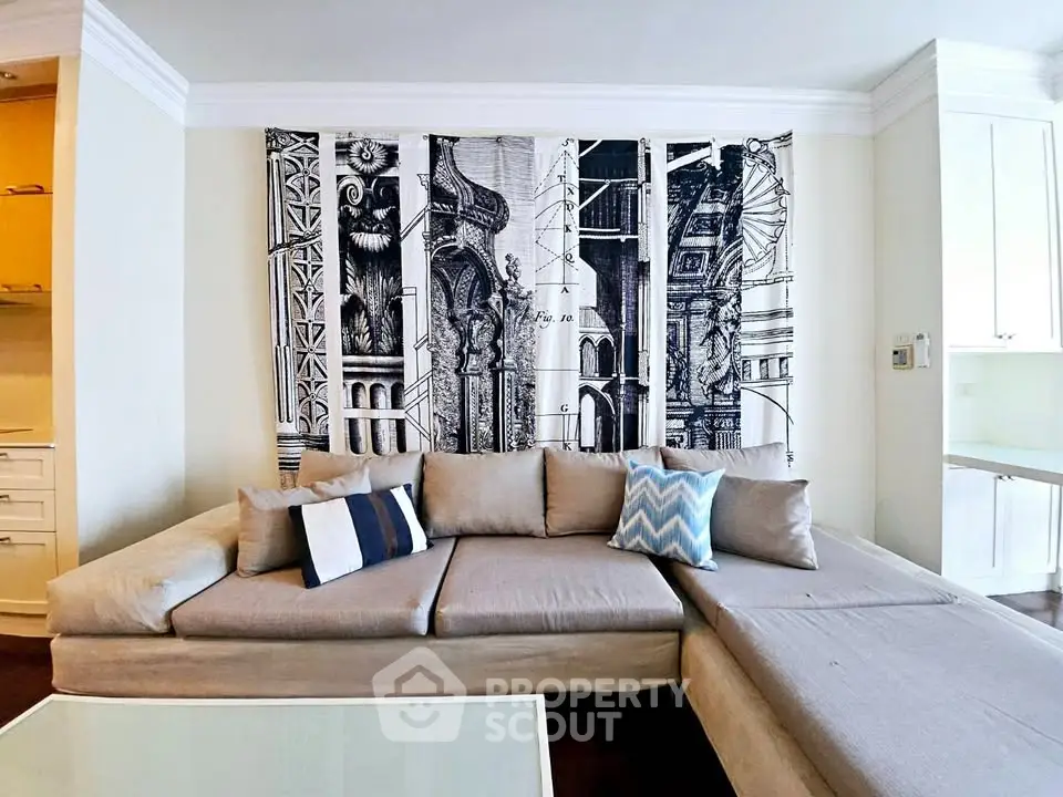 Stylish living room with modern sectional sofa and artistic wall decor