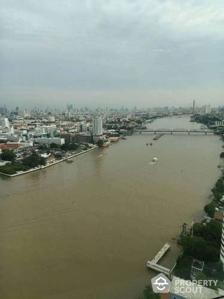 Stunning river view from high-rise building in bustling cityscape