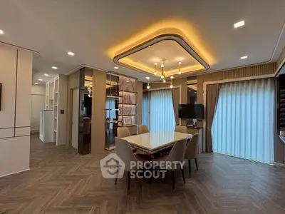 Luxurious dining area with modern lighting and elegant decor