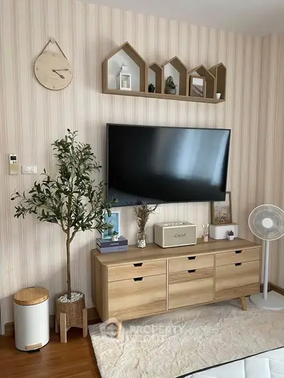 Stylish living room with modern TV setup and elegant decor